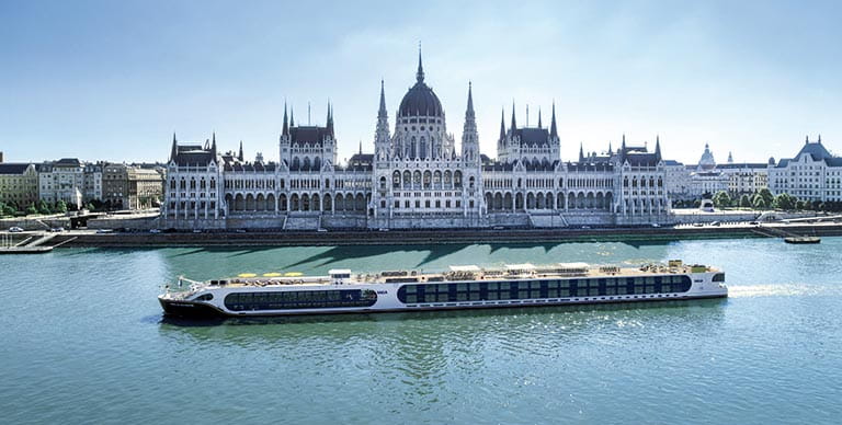 Spirit of the Danube sailing past the Parliament Building in Budapest, Hungary